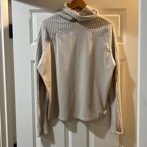 Cream Nike turtle neck pullover